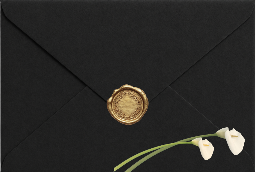 Black envelope with a gold wax seal and white flowers